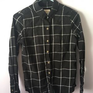 Black striped button down shirt.